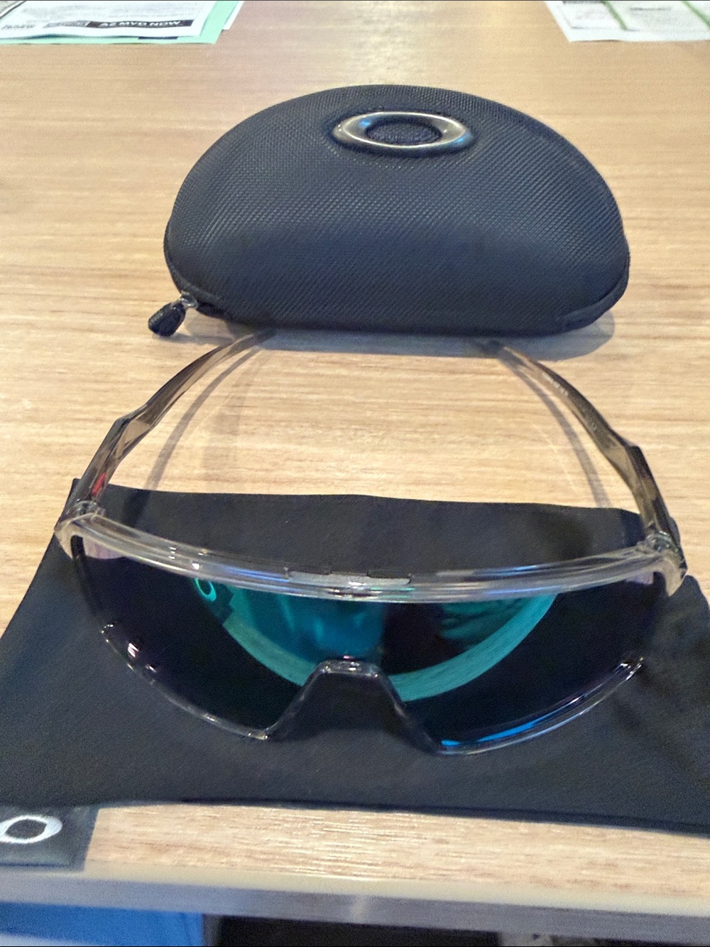Oakley Clear Frame Sutro Glasses with Black Mirrored Lens and Black Case